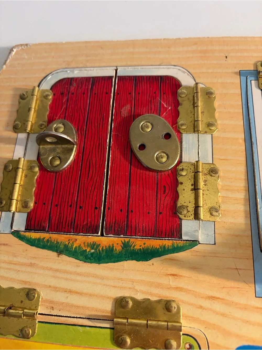 Melissa & Doug Wooden Latches Board - Red, Blue, Yellow, Green, Brown